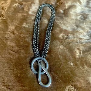 Avant Garde pull through chain silver necklace made in Paris